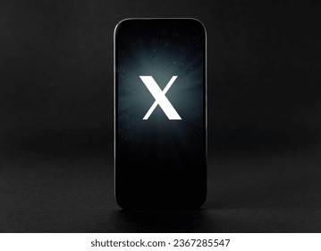 Mobile phone with a letter X on the screen