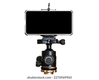 Mobile phone on a tripod, white isolated background. blank black screen. copy space