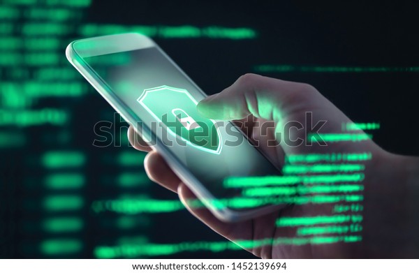 Mobile phone personal data and cyber security\
threat concept. Cellphone fraud. Smartphone hacked with illegal\
spyware, ransomware or trojan software. Hacker doing online scam.\
Antivirus error.
