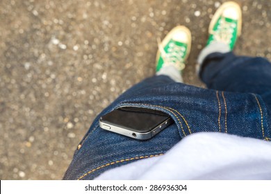  Mobile phone in pocket jeans