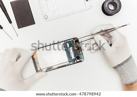 mobile phone repairing, flat lay, top view
