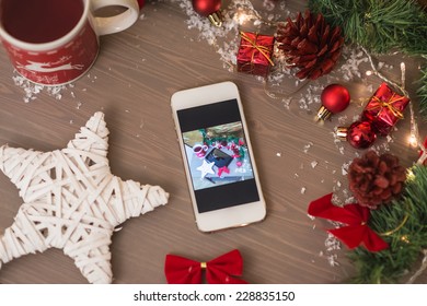 Mobile Phone In Retro Xmas Decoration