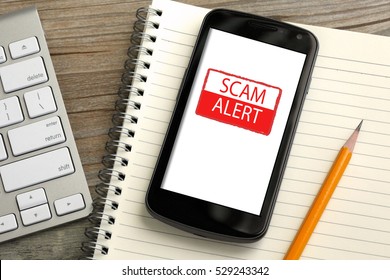 Mobile Phone Showing Scam Alert Warning