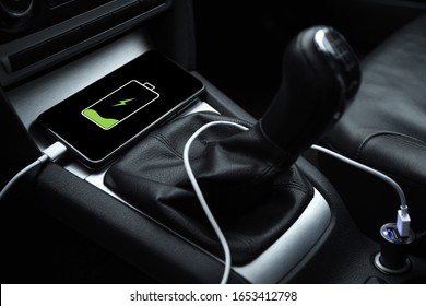 Mobile Phone, Smartphone Charge Battery, Charging In The Car Plug Close Up.