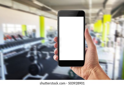 Mobile Phone In Sport Gym. Isolated White Screen For Mockup.