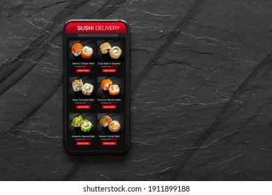 Mobile Phone With Sushi Or Food Online Ordering Website Mockup