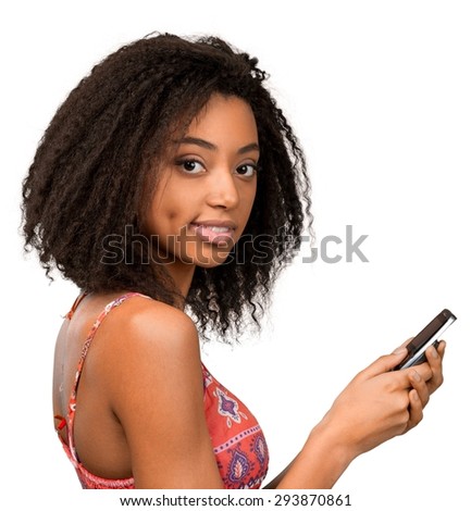 Similar – Serious black woman with afro hair looking at her smart phone outdoors.