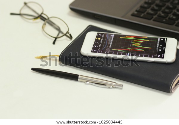 Mobile Phone Trade Forex On Desk Stock Photo Edit Now 1025034445 - 