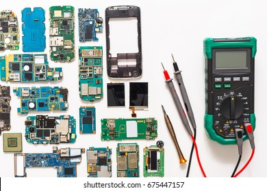 Mobile Repair Flat Lay. Dissasembled Smartphone Top View. Technician Workplace With Instruments And Cell Phone Components