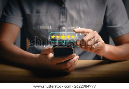 Mobile review and customer feedback concept with user giving five-star rating on smartphone. Online reputation management, service evaluation, and digital experience enhancement for businesses.