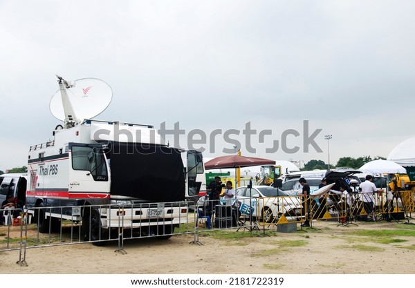 Mobile satellite communication vehicle for\
service and report news in Sanam Luang public garden park at Wat\
Phra Kaew temple or Wat Phra Si Rattana Satsadaram on October 16,\
2016 in Bangkok Thailand