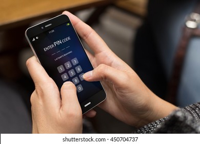 mobile security concept: girl using a digital generated phone with security pin code on the screen. All screen graphics are made up.