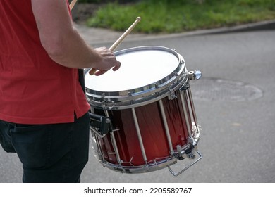 Mobile Snare Drum Played In A Marching Band, Musical Percussion Instrument For The Rhythm At A Parade On The Street, Selected Focus, Narrow Depth Of Field