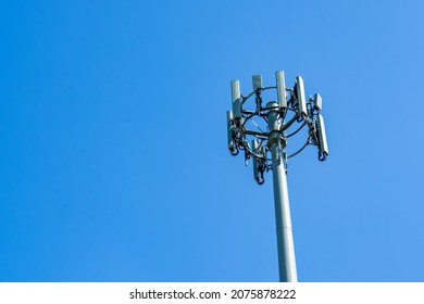 Mobile telecome cell tower on blue sky background. Australia