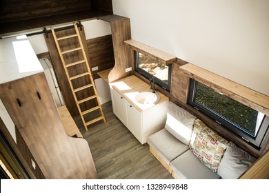 Mobile tiny house interior. Great for outdoor experiences and wildlife. Lots of space and pure adventure. No need for special authorizations, only a decent car to pull this tiny house and off you go.