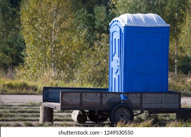 Mobile toilet. Temporary cabin toilet on a trailer in the woods