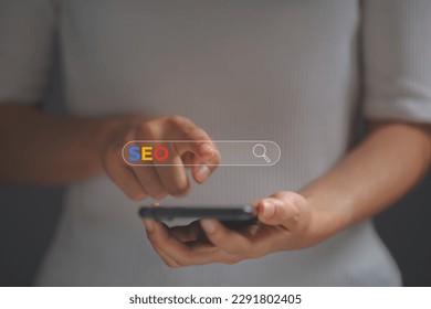 Mobile users are using search engines. SEO Search Engine Optimization, Website improvement concept to make search results higher and get websites ranked in top search rankings.