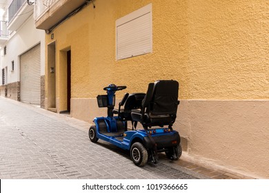 Mobility Scooter In The Street