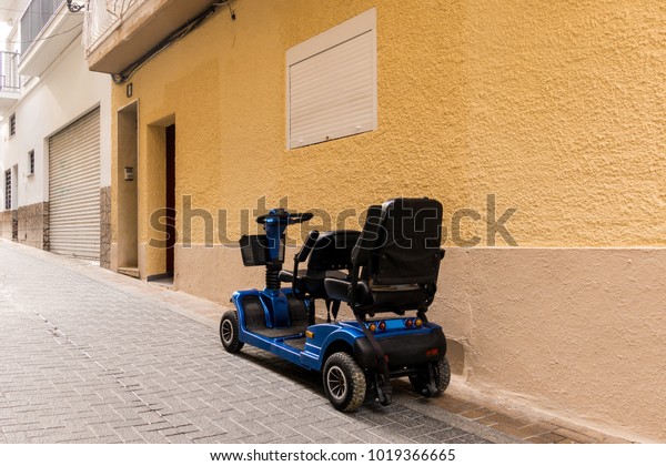 Mobility scooter in the\
street