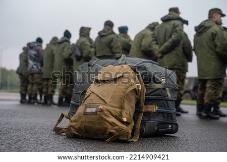 Mobilization in Russia. The gathering of recruits for the Special Military Operation in Ukraine. A soldier's duffel bag. Soldiers with things waiting mobilization. 