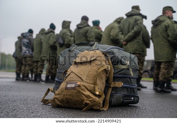 Mobilization in Russia. The\
gathering of recruits for the Special Military Operation in\
Ukraine. A soldier\'s duffel bag. Soldiers with things waiting\
mobilization. 