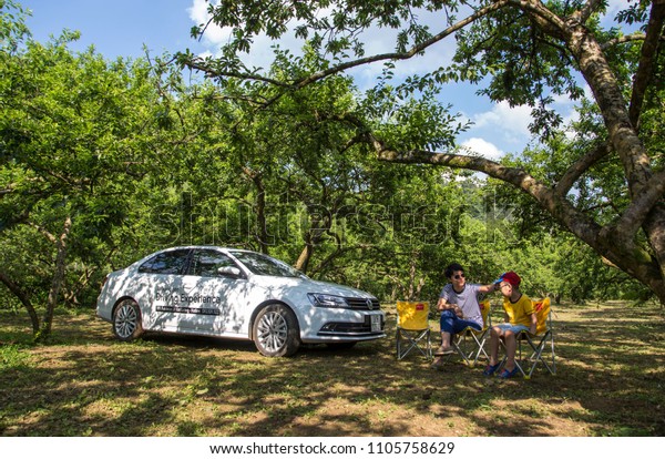 Mocchau, Vietnam - May 16,\
2018: Volkswagen Jetta car on the mountain road in test drive in\
Vietnam.