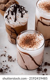 Mocha Latte And Iced Frappe Topped With Whipped Cream And Chocolate Syrup, Refreshing And Sweet Coffee Drinks