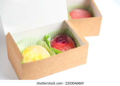 Mochi In A Box, Asian Dessert, Rice Cakes, Sweets Delivery, Traditional New Year Treat On White Background With Space For Text.