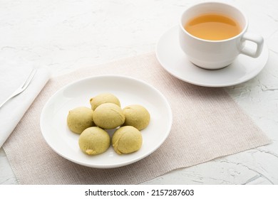 Mochi Cakes With Durian And Salted Egg Filling On White Plate