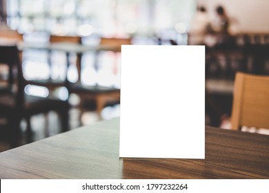 Mock up acrylic frame posters pattern template forms background, blank menu frame on table in coffee shop or restaurant stand for your text of display your product. - Shutterstock ID 1797232264