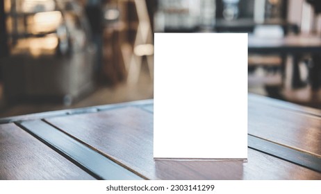 Mock up acrylic frame posters pattern template forms background, blank menu frame on table in coffee shop stand for your text of display your product.