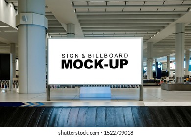 Mock Up Blank Large Horizontal Billboard With Clipping Path At Baggage Claim Point In Airport Terminal, Empty Space For Advertising Or Public Information, Advertisement Concept