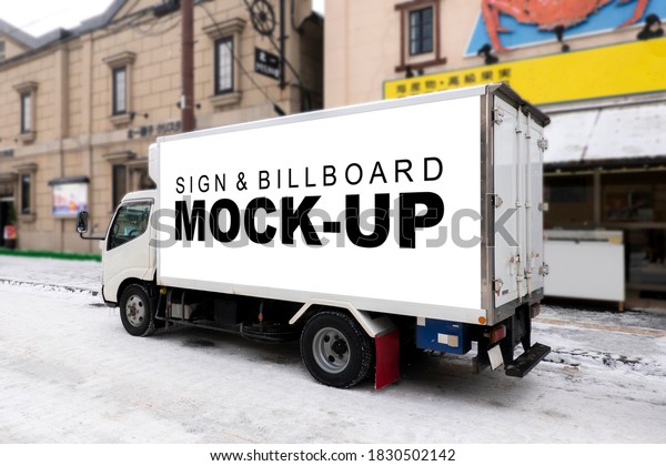 Mock up blank mobile\
billboard with clipping path on beside of cargo truck, Perspective\
Empty space for insert advertising, graphic design or announcement\
information