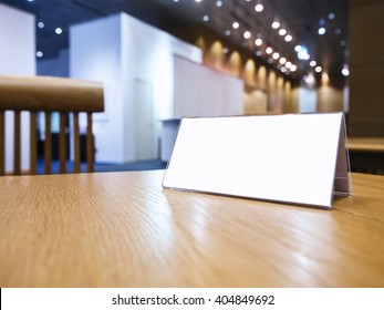 Mock Up Blank Sign On Desk Event Hall Background