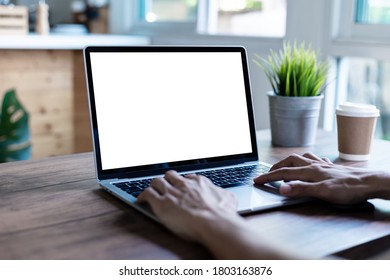mock up businessman working empty screen computer on wood desk in home - Shutterstock ID 1803163876
