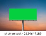 Mock up concept - green screen billboard on highway with traffic at evening time at beautiful sunset