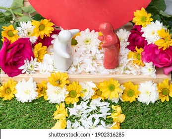 Mock up couple hugging at a simulated wedding decorated with roses and flowers. Valentine day concept
