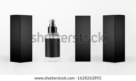 Mock up for design of packing cosmetics product - small transparent spray bottle, black label and black paper boxes of different sides on white background.