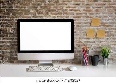 Mock Up Desktop On White Wood Table With Blank Screen Computer, Dummy, Houseplant. Desk Workspace With Copy Space For Products Display Montage.