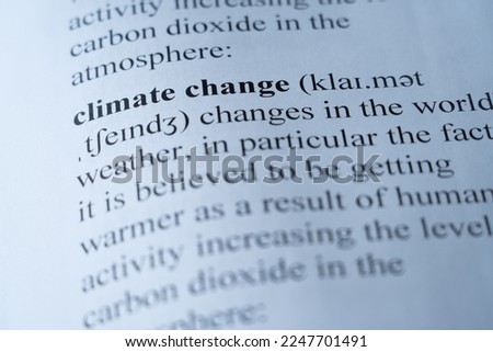 A mock up of a dictionary page with the word climate change with selective focussing