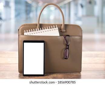 Mock Up Digital Tablet Pc With Blank Screen. Workspace With Bag, Business Briefcase, Mockup Blank Digital Tablet On Wooden Office Table