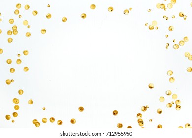 Mock Up Frame With Space For Text Made Of Golden Confetti On White Background. Flat Lay, Top View. Minimal Background.