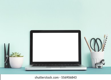 Mock Up Laptop, Notebook On Young Student Desk. Cyan Pastel Colors.