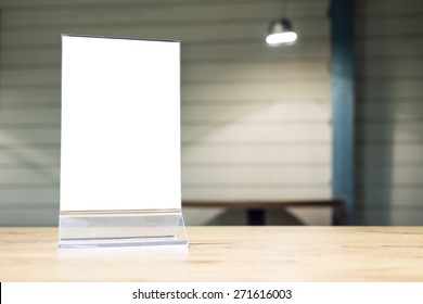 Mock Up Menu Frame On Table In Restaurant Cafe 