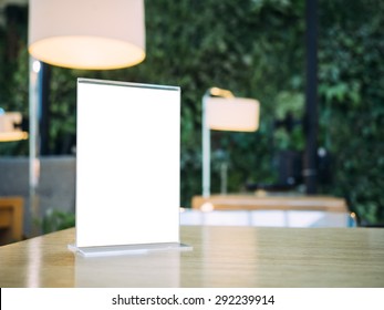 Mock Up Menu Frame On Table In Restaurant Cafe