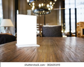 Mock Up Menu Frame On Table With Restaurant Cafe Shop Interior Background