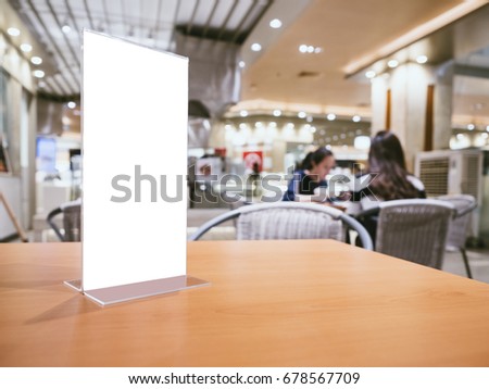Mock up Menu frame on Table Bar restaurant cafe Background with people