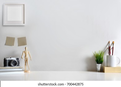 Mock Up Modern Home Decor With Camera, Dummy, Houseplant. Artist Workspace With Copy Space For Products Display Montage..
