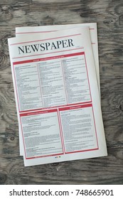 Mock Up Newspaper On Wooden Background