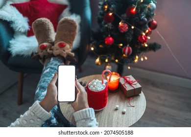 Mock Up Phone With Place For Your Text On A Cozy Christmas Background.